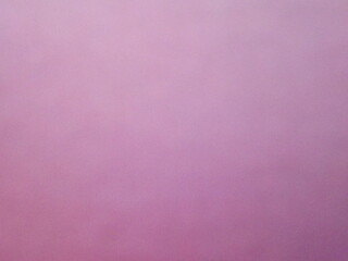 Purple solid color surface of colored paper as a background. High quality photo