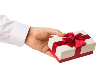 Man's hand holding a box with a gift, isolated on white background, template for designers