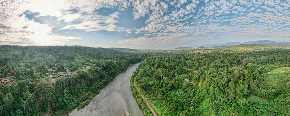 Aerial view of the river and the Amazona Rainforest in Tena, Ecuador