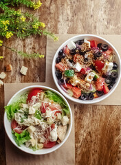 Salad in a disposable glass close-up. Healthy and fast food. Takeaway cafe. Disposable tableware for food safety. Healthy fast food