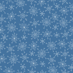 Snowflakes seamless pattern. White doodle snowflakes on blue background. Line art. Background for winter design. 