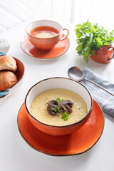 Mushroom cream soup with greens for dinner