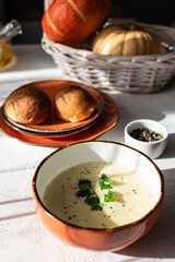 Cheese cream soup with greens for lunch
