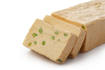 Turkish dessert halva slices isolated on white