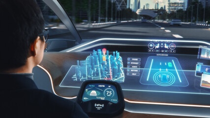 Futuristic Concept: Stylish Businessman Setting Location on an Interactive 3D Navigation App on an Augmented Reality Dashboard while Sitting in an Autonomous Self-Driving Zero-Emissions Electric Car. 