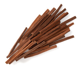 Sandalwood sticks isolated on white background, top view