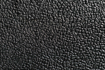 the artificial leather texture in black for a background pattern collection. a detailed element graphic for a creative design.