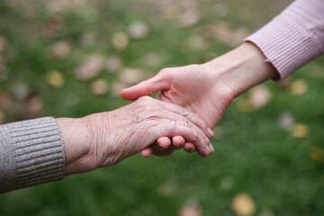 Helping hands. The concept of care for the elderly