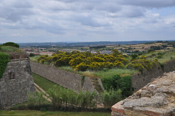 Fototapeta na wymiar Panoramic view of the old fortress walls. Cloudy before rain. Thunderclouds.