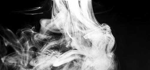 white smoke in the lamplight