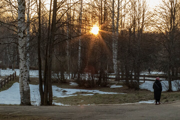Russia. Spring. Morning. Sanatorium Lunevo. View of the path of the Volga bank of a stranger going for a walk.