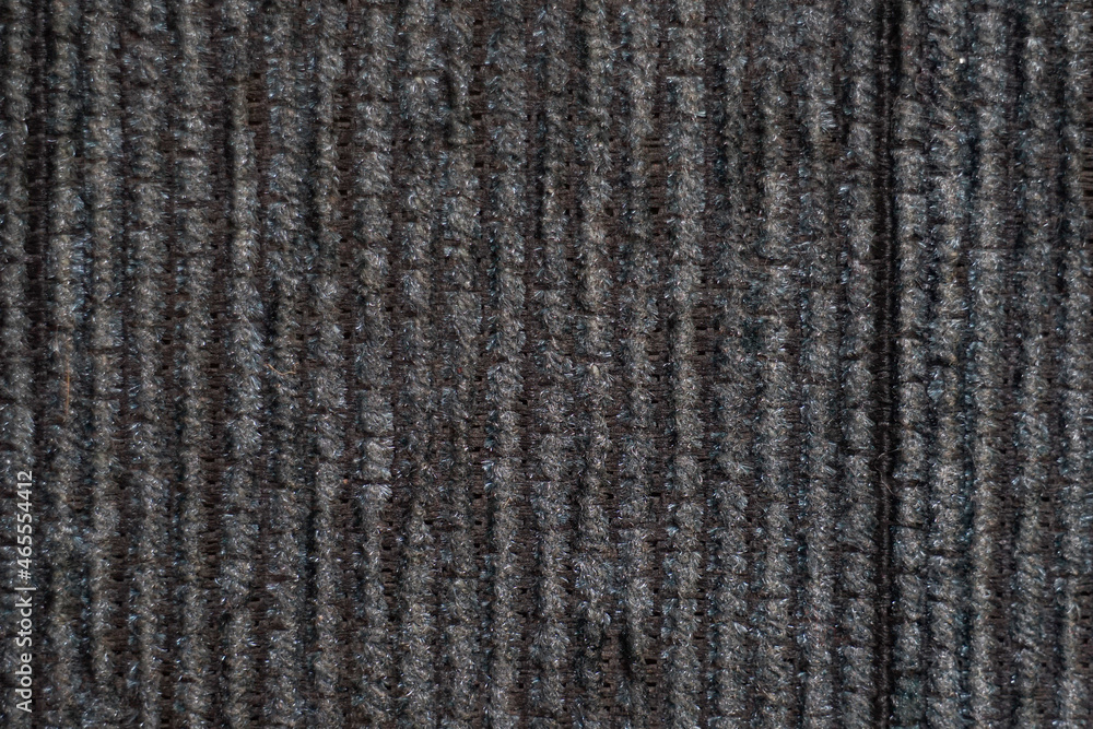 Poster the abstract surface of the lines embossed fabric in brown for a background pattern. a detailed elem