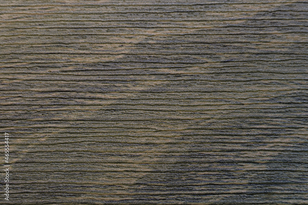 Poster the abstract singular surface of the slick plywood in brown for a background pattern. a detailed ele