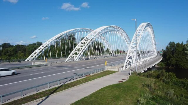 The blue sky over Vimy Memorial Bridge over Rideau river