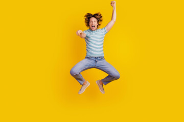 Full length body size photo of young guy jumping up imagine rodeo isolated vibrant yellow color...