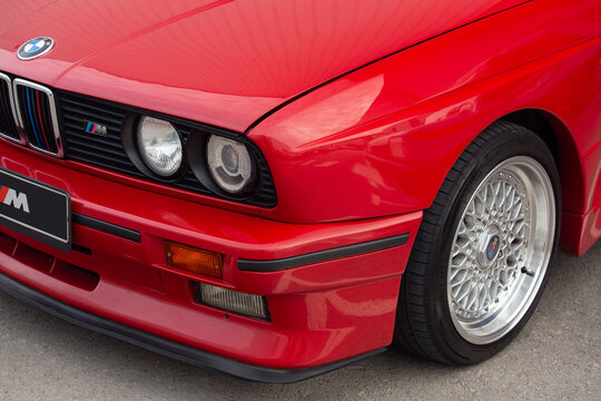 Cartes, Spain - October 16, 2021: Clasic car show. The first BMW M3 was based on the E30 3 Series ,and It was presented to the public at the 1985 Frankfurt Motor Show. In the photo an example in red