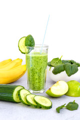 Spinach, apple, banana and cucumber smoothie. Detoxification of the body. Healthy eating.