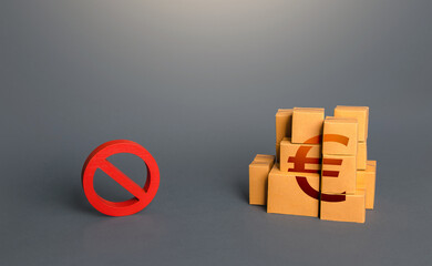Euro goods boxes and prohibition symbol NO. Trade wars. A ban on import of goods. Impossibility of...