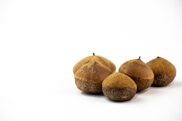 Close up photo of nut on white background.