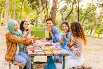 Christmas gift surprise box for new year celebration. Lifestyle multiehtnic group