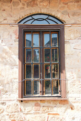 Fototapeta na wymiar wooden windows on the facade of the building