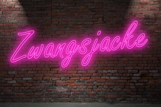 Neon BDSM Straitjacket fetish (in german Zwangsjacke) lettering on Brick Wall at night
