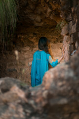 Back view of a girl in Pakistani dress standing in Rohtas Fort