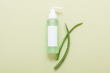 Natural cosmetic products with aloe vera on a light green background. Cosmetic jar mockup.