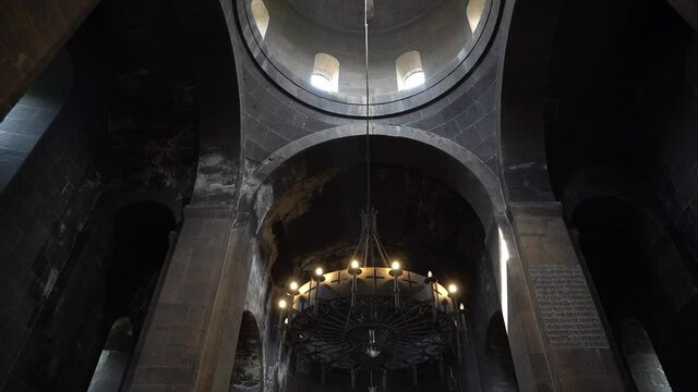 Inside  ancient Armenian church. Сhandelier hanging from the ceiling of the church. Saint Gevork Monastery or Saint George's Monastery of Mughni, Armenia. 