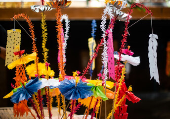 Fototapeta premium Phuangmahot is an ancient hanging machine made of paper of various colors, folded and cut into different shapes to hang. Used to hang in auspicious events only, Ratchaburi, Thailand.