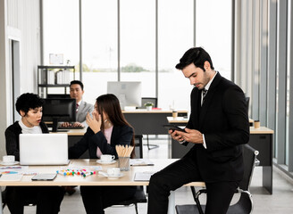 Young manager communicating through social media. The conversation was very serious. Doing business between trade partners there are business negotiations with tremendous benefits.