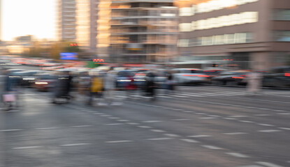 Blurred Crowd of unrecognizable  people walking on Zebra crossing.Cityscape.