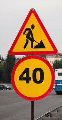 Prohibitory signs. Maximum speed limit (40 km/h). Roadworks sign.