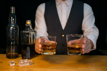 Barman pouring whiskey whiskey glass beautiful night