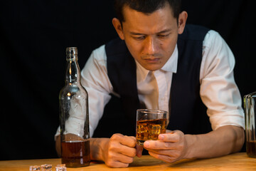 Businessmen in suits drinking whiskey