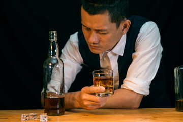 Businessmen in suits drinking whiskey