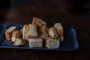 Toasted bread cut into bite-sized pieces