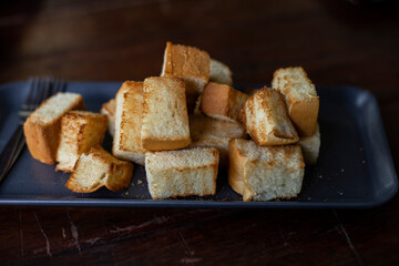 Toasted bread cut into bite-sized pieces
