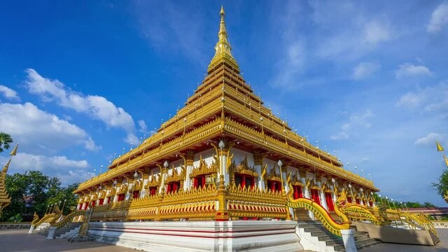 Time lapse 4k Golden ancient pagoda of Phra Mahathat Kaen Nakhon temple, Thai traditional religious histoty travel attraction in Khon Kaen, Thailand