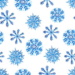 Seamless pattern with blue watercolor snowflakes on white background. Hand painted winter illustration.