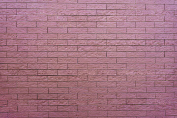 Background of pink purple brick wall pattern texture