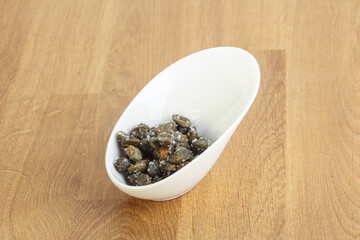 Salted marinated capers snack appetiser