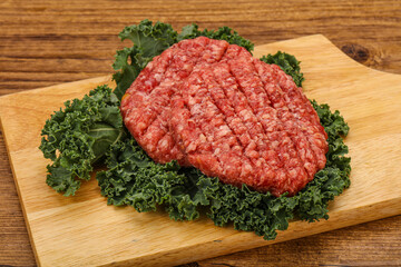 Raw beef burger cutlet for cooking