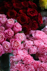 bouquets of red and pink roses in a flower shop, flowers for valentine's day