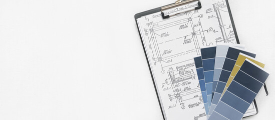 Architect works remotely from home in quarantine, lockdown covid 19 coronavirus. Remote work, stay home, new normality, social distance. Architect design working drawing sketch plans blueprints