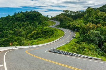 Fototapeta premium New Unseen Curved road number 3 on Route Number 1081 Santisuk - Bo Kluea District, Nan province, Thailand.