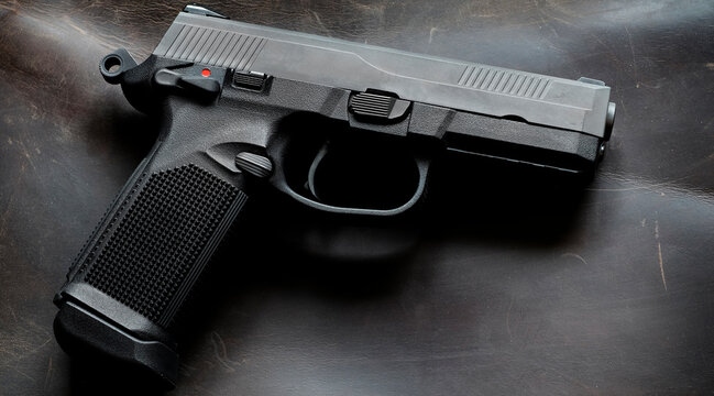 Handguns Pistols on Leather Background Weapons for Self Defense Firearm Gun