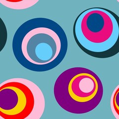 Multicolored abstract endless patterns on a green background, seamless pattern of multicolored circles.