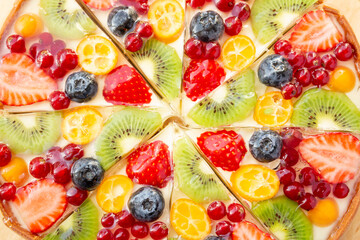 Fresh dietary dessert made of cow cream and frozen fruits and berries. Pie baked in oven. concept is vegetarian desserts.