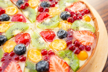 Fresh dietary dessert made of cow cream and frozen fruits and berries. Pie baked in oven. concept is vegetarian desserts.